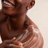 Model Lathering Up With Body and Hand Wash